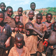 Africans gather in hopes of receiving the Bibles they have hoped for.